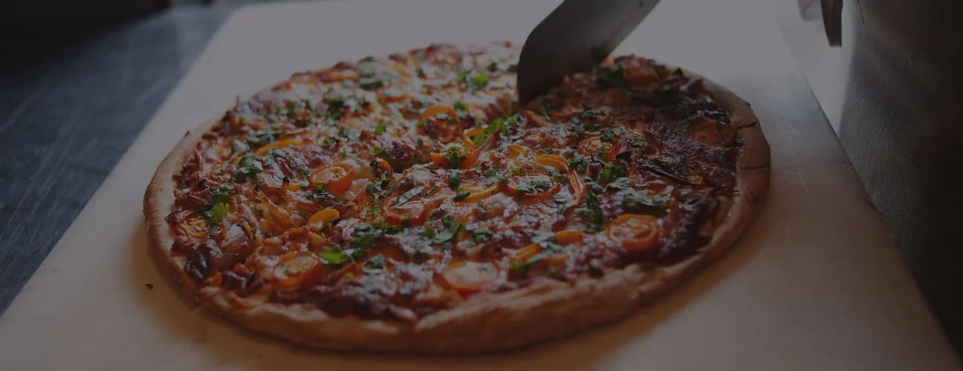 A handmade pizza photographed for Demitasse in Oak Bay